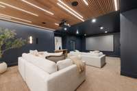 New XL home theater with THX/Dolby Atmos sound, Sony Native 4K SXRD Laser projector, a 160” Zero Edge Pro acoustic screen, 13 speakers, 2 subwoofers, and stunning lighted wood paneling—built for the ultimate cinematic experience.