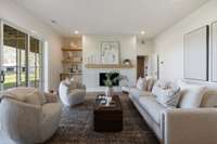 The versatile lounge space features a hand-applied plaster fireplace, full bathroom, and laundry connections. This space can also double as a luxurious sixth bedroom or guest suite.
