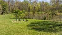 Enjoy the peaceful beauty and recreational perks of your very own pond—perfectly situated on the property for fishing, picnics, or simply soaking in the serene views.