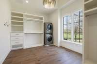 The primary closet includes convenient laundry hookups for everyday ease.