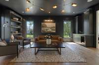 Hand-selected designer lighting by Arteriors adds a refined and artistic touch throughout the home.