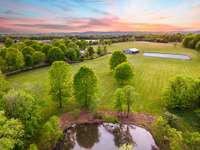 The 56.7 acres and equestrian facilities provide the ideal setting for trail rides with guests and weekend adventures, all without ever leaving the comfort of this stunning Franklin countryside estate.