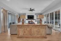 Large family room with fireplace and built in bar
