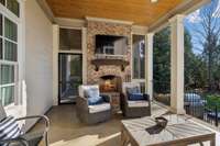 Plenty of outdoor space with covered porch & screened in porch off primary.
