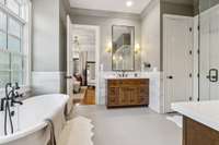 His/Her vanities w/ claw foot tub.