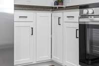 Custom craftsman-style cabinets with shaker style doors and soft close drawers