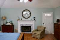 Primary Bedroom with gas Fireplace.  This bedroom is so roomy