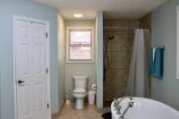 Primary Bathroom ceramic tile shower