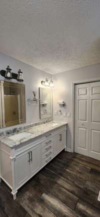 Primary Bath with Double Sink Vanity, 2 Custom Walk-In Closets, Separate Shower and Custom Jetted Tub