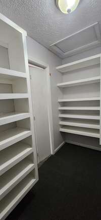 1 of the 2 Custom Walk-In Closets
