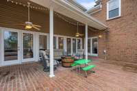 Back covered patio, perfect for entertaining.  Right off living area and kitchen