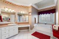 Master bathroom suite with huge his/her vanity, jet tub, over sized walk in closet