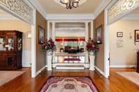 Spacious foyer opens to the dining room, office and living area
