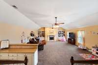 Huge bonus room with wet bar and fireplace
