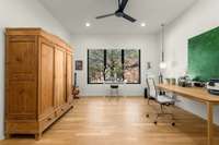 En-suite Bedroom 1 sits on the main level, perfect for guests or office space.
