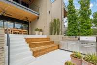Sellers added beautiful cedar benches + outdoor kitchen...