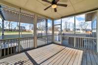 Screened in back porch with firepit