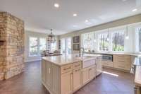 Spacious kitchen carefully designed to maximize storage and efficiency.