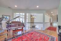2nd floor Flex space with piano that remains.