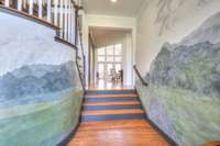 Welcoming custom painted foyer