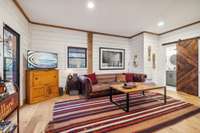 Downstairs lounge with bath