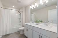 Full Bath located near Secondary Bedrooms off Hallway