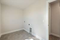 Large Laundry Room w/Windows Providing Lots of Natural Light