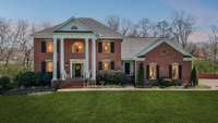 Multi-Generational Living Available Near Berry Farms Town Center! Around 2 miles from I-65 at Peytonsville Rd. Sits on over an acre with tree lined back yard.