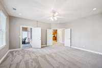 Lovely new carpet.  This room used as 5th bedroom but listed as "exercise room" on MLS.  It leads to covered screen in porch and the living area of basement "in-law" suite.