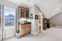 The Bonus room features a Wet Bar, great for entertaining or snacking and a half bath for convenience.