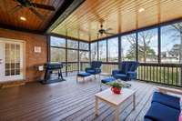 This covered deck extension that is screened-in is a dream! It adds a lot of living space.