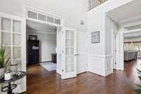 Step into your home office through these double glass doors.