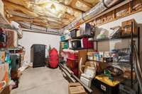 Storage with Garage Door Entry from Rear of Home.