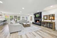Living Room with Painted-Brick Gas Fireplace
