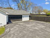 2-Car Side Attached Garage with Epoxied Flooring & Extra Storage