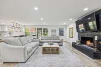 Living Room with Painted-Brick Gas Fireplace