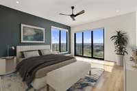 Large primary bedroom on main floor with walk in closet, balcony and private bath.