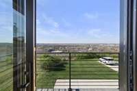 Enjoy a cup of coffee on you primary bedroom balcony