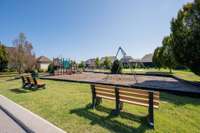 The neighborhood playground offers a safe, fun space for kids to play and explore, just a short walk from your door.