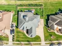 Beautifully manicured lot with a large fenced backyard, mature landscaping, and oversized driveway. Ample space for relaxing, entertaining, or play with great privacy from neighbors.