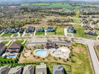 Resort-style community pool with a separate kids’ area, clubhouse, and plenty of space for lounging. A perfect spot to cool off, relax, or connect with neighbors just a short walk from your doorstep.