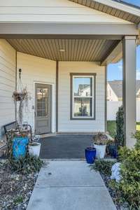 Front walkway to a covered porch