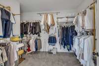 Walk-in closet attached to the owner's bath.