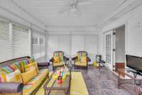 Another view of the sunroom.  The french doors lead to the kitchen.