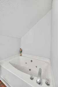 Jetted garden tub to soak away your stress.