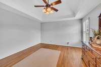 This photo of the bedroom was taken from the primary bathroom door.  You'll notice there's not a lot of furniture in the home.  The seller wants you to visualize your belongings in the space & they've already got a jump on packing.