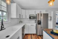 More views of this fabulous kitchen.  This is a U shaped kitchen with an island in the middle.  Lots of room for helpers when it comes time to prepare meals.