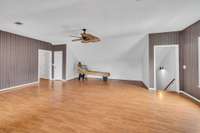This room is almost empty but this lets you imagine how you would use the space.  It's large enough that maybe you use it for multiple uses.