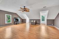 This room is located on the 2nd floor. It was used as a bonus room but could be a 5th bedroom, home schooling, craft room, game room, man cave, home office, home gym, etc.    Lots of natural lighting. Floors are LVP,