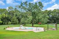 The pool area will become your summer fun spot.  Lots of room for family and friends.  The pool is located further in the yard so you have plenty of space to add any features you would want.